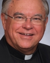 Rev. Robert DeLand